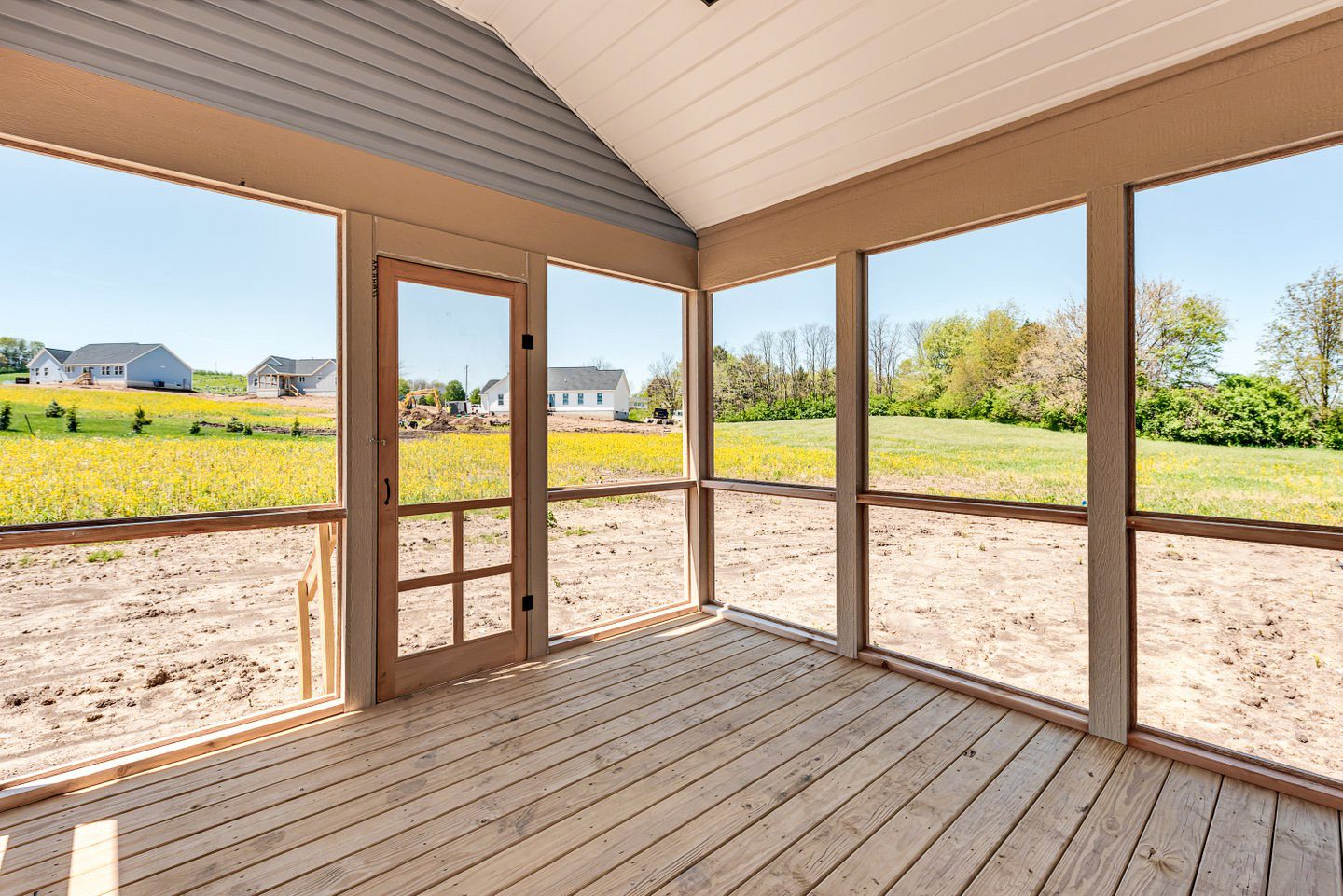 Screened porch of the Pendleton looking into yard.