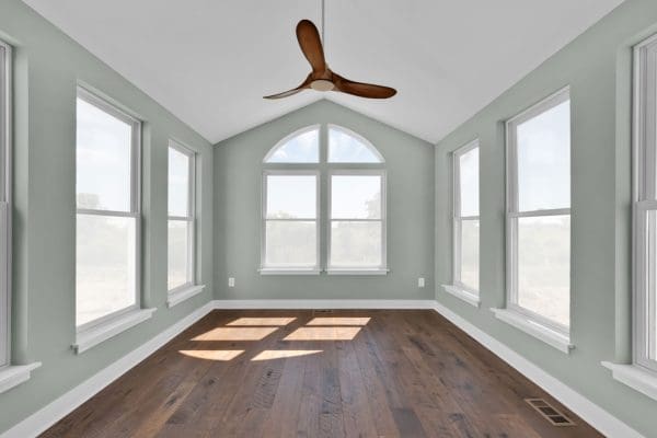 Sunroom off the kitchen in the Madison II with plenty of windows.