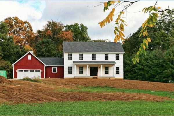The Madison II farmhouse similar to our model home on your lot.