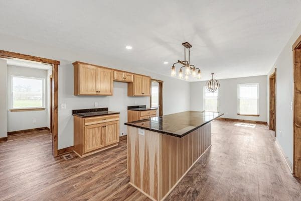 Kitchen of customized Walnut Creek design with Hickory stained cabinets and island with granite counters.