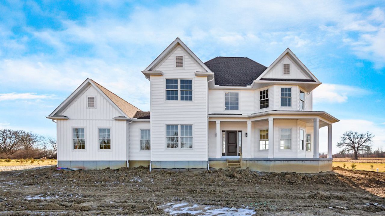 Video walk through photograph of the Charlevoix with white siding.