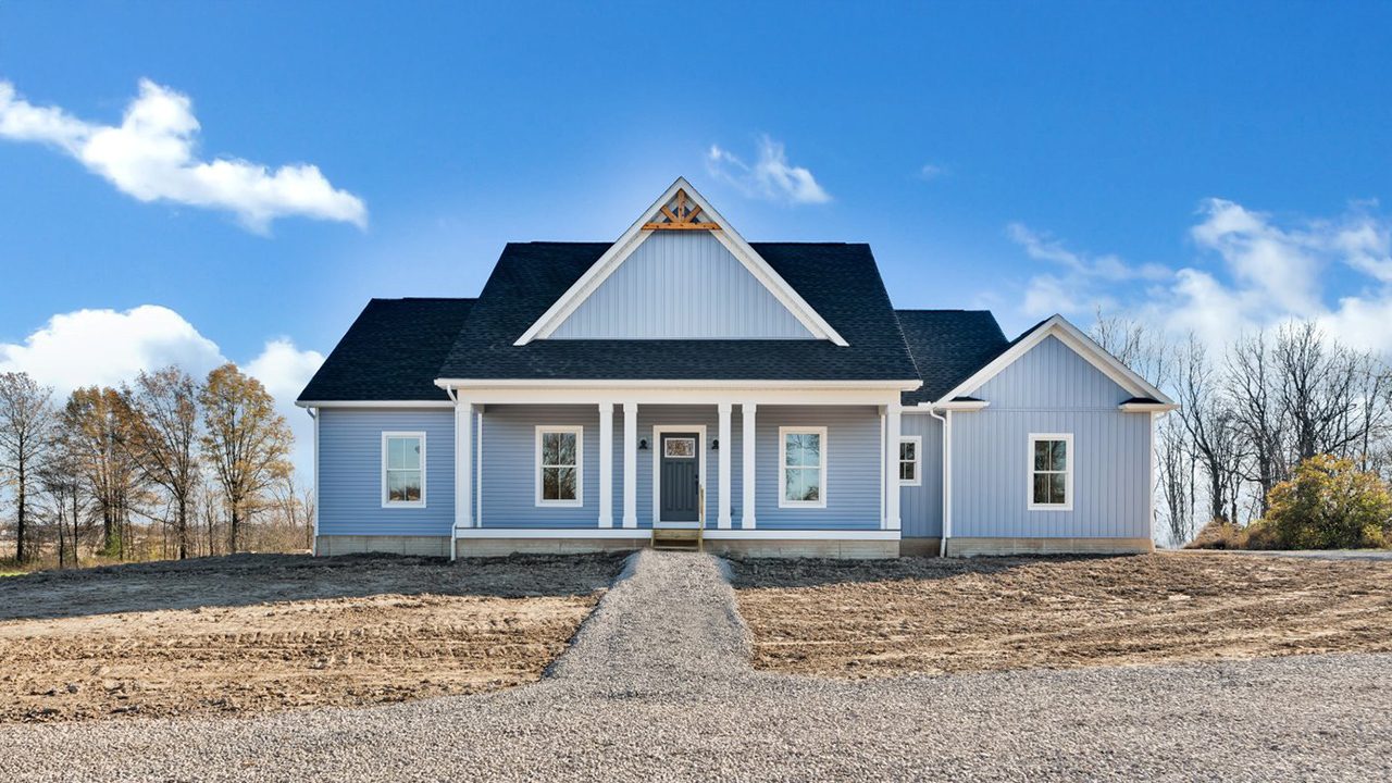 Video walk through photograph of the Pinehurst with blue siding.