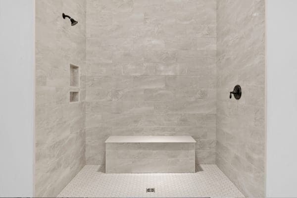 Clark shower tiled with bench.