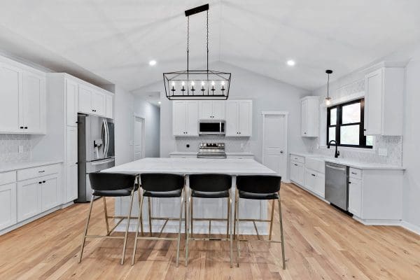Custom Clark kitchen with white cabinets and countertops.
