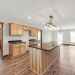 Kitchen of customized Walnut Creek design with Hickory stained cabinets and island with granite counters.