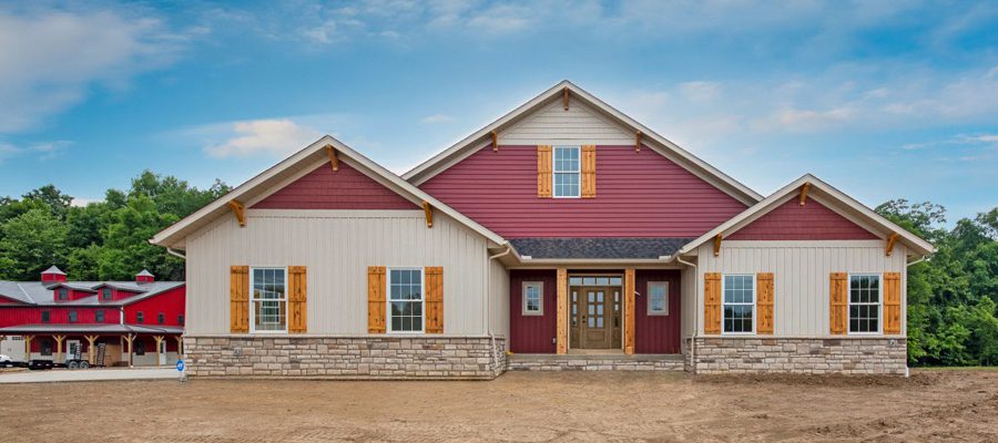 Image of the Glenbrooke with red siding and light tan colored siding.