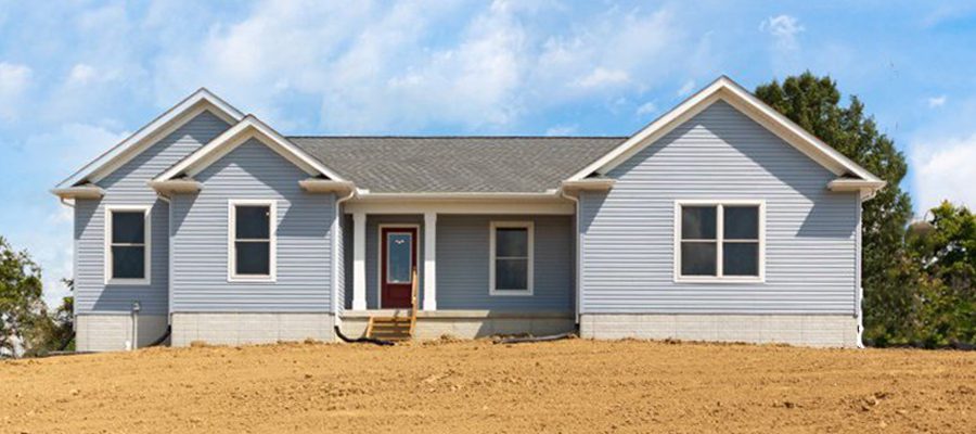 The Butler exterior with blue siding, white trim and red front door blog main image.