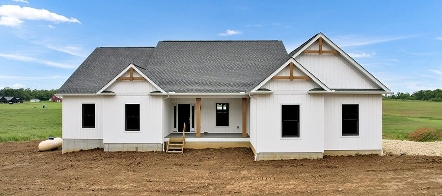 Blog header image of a custom Clark a one story farmhouse design.
