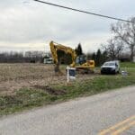 Excavator starting site work for a new custom home in Central Ohio
