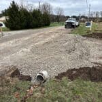 Gravel construction entrance installed for access to home site