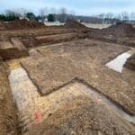 Foundation footprint visible after excavation and site preparation